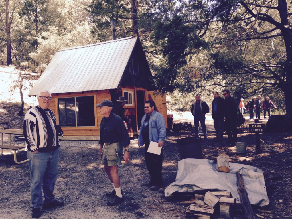 Rotary Club of Idyllwild members inspect the cook shed and campground area
